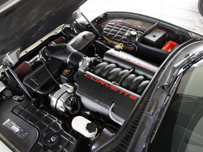 chevrolet corvette 2002 tan coupe 2dr cpe gasoline 8 cylinders rear wheel drive automatic 76137