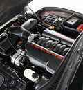 chevrolet corvette 2002 tan coupe 2dr cpe gasoline 8 cylinders rear wheel drive automatic 76137