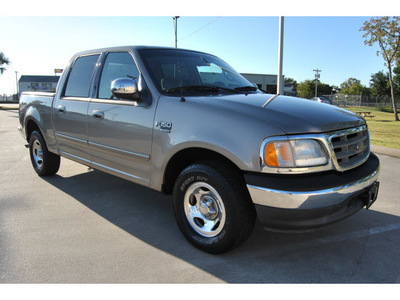 ford f 150 2002 beige supercrew gasoline 8 cylinders rear wheel drive automatic with overdrive 77539