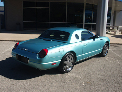 ford thunderbird 2002 lt  blue deluxe gasoline 8 cylinders rear wheel drive automatic 76049