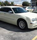 chrysler 300 2009 off white sedan limited gasoline 6 cylinders rear wheel drive automatic 77070
