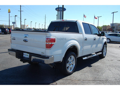 ford f 150 2010 white lariat flex fuel 8 cylinders 4 wheel drive automatic with overdrive 77642