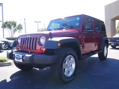 jeep wrangler unlimited 2012 red suv sport gasoline 6 cylinders 4 wheel drive automatic 75075