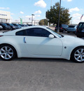 nissan 350z 2003 white coupe gasoline 6 cylinders rear wheel drive 6 speed manual 77074
