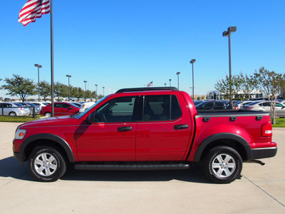 ford explorer sport trac 2010 dk  red suv xlt gasoline 6 cylinders 2 wheel drive automatic with overdrive 76018