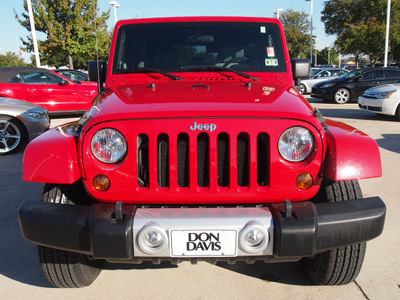 jeep wrangler unlimited 2010 red suv sahara gasoline 6 cylinders 4 wheel drive automatic with overdrive 76011