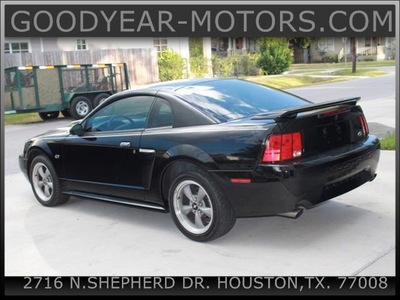 ford mustang 2002 black coupe gt deluxe gasoline 8 cylinders rear wheel drive automatic with overdrive 77008