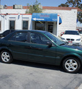 mazda protege 2000 green sedan es 4 cylinders 5 speed with overdrive 92882