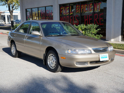 mazda 626 1997 gold sedan lx gasoline 4 cylinders front wheel drive automatic 75080