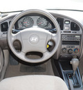 hyundai elantra 2005 white sedan gls gasoline 4 cylinders front wheel drive automatic 75141