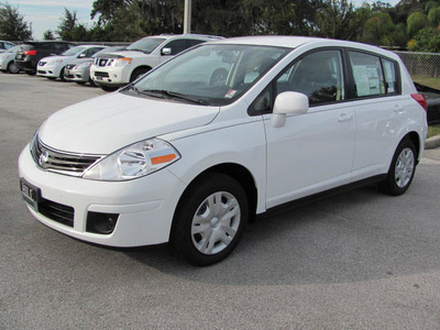 nissan versa 2012 white hatchback s gasoline 4 cylinders front wheel drive automatic 33884