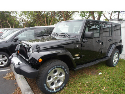 jeep wrangler unlimited 2013 silver suv sahara gasoline 6 cylinders 4 wheel drive automatic 33157