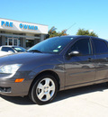 ford focus 2007 dk  gray sedan zx4 ses gasoline 4 cylinders front wheel drive automatic with overdrive 76011