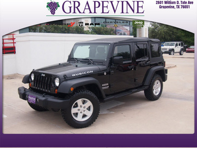jeep wrangler unlimited 2010 black suv sport gasoline 6 cylinders 4 wheel drive not specified 76051