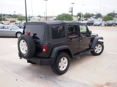 jeep wrangler unlimited 2010 black suv sport gasoline 6 cylinders 4 wheel drive not specified 76051
