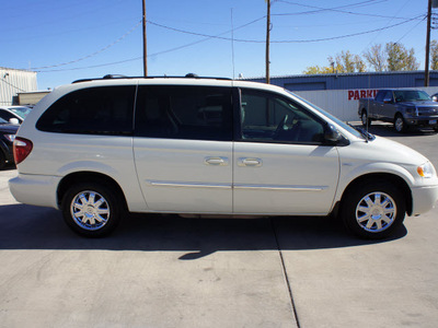 chrysler town and country 2007 white van touring gasoline 6 cylinders front wheel drive automatic 79110