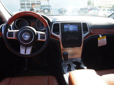 jeep grand cherokee 2013 black suv overland gasoline 8 cylinders 4 wheel drive automatic 77388