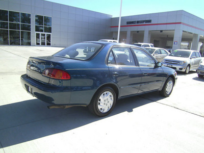 toyota corolla 2002 blue sedan le gasoline 4 cylinders front wheel drive automatic 75503