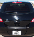 nissan versa 2011 black hatchback 1 8 s gasoline 4 cylinders front wheel drive automatic with overdrive 76018