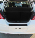 nissan versa 2012 white hatchback sl gasoline 4 cylinders front wheel drive cont  variable trans  33884