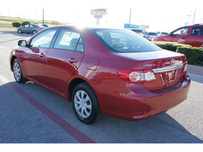 toyota corolla 2011 red sedan le gasoline 4 cylinders front wheel drive automatic 76543