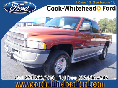 dodge ram 1500 2001 orange slt gasoline 8 cylinders 4 wheel drive automatic 32401