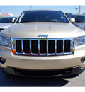 jeep grand cherokee 2011 gold suv laredo gasoline 6 cylinders 4 wheel drive automatic 33157