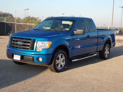 ford f 150 2009 blue stx gasoline 8 cylinders 2 wheel drive automatic with overdrive 77074