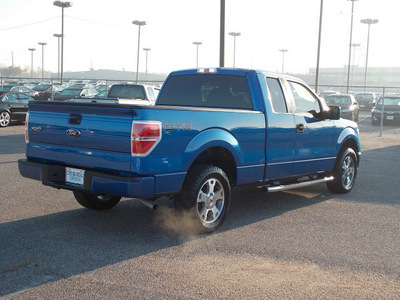 ford f 150 2009 blue stx gasoline 8 cylinders 2 wheel drive automatic with overdrive 77074