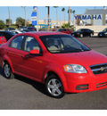 chevrolet aveo 2011 red sedan lt gasoline 4 cylinders front wheel drive automatic 78539