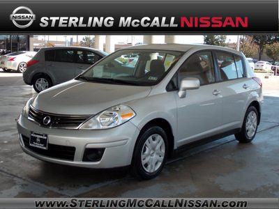 nissan versa 2011 silver hatchback 1 8 s gasoline 4 cylinders front wheel drive automatic with overdrive 77477