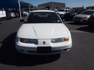 saturn sl1 2002 white sedan gasoline 4 cylinders front wheel drive automatic 76234