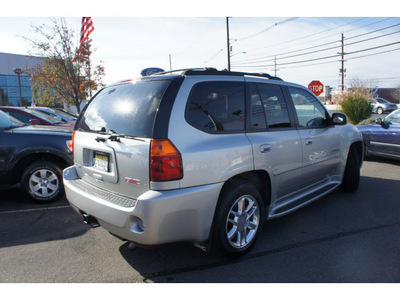 gmc envoy 2006 silver suv denali gasoline 8 cylinders 4 wheel drive automatic with overdrive 08902