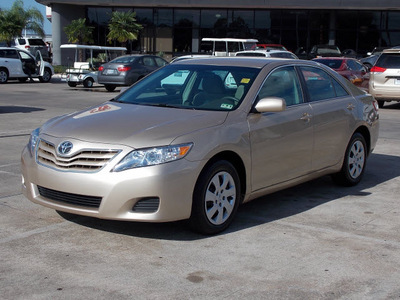 toyota camry 2011 tan sedan le gasoline 4 cylinders front wheel drive automatic with overdrive 77074