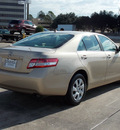 toyota camry 2011 tan sedan le gasoline 4 cylinders front wheel drive automatic with overdrive 77074