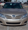 toyota camry 2011 tan sedan le gasoline 4 cylinders front wheel drive automatic with overdrive 77074