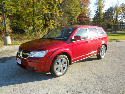 dodge journey 2009 dk  red suv sxt gasoline 6 cylinders front wheel drive automatic 75657