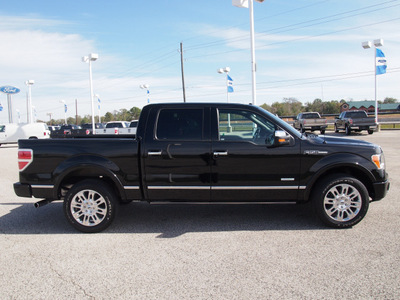 ford f 150 2011 black platinum 6 cylinders automatic 77532