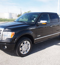 ford f 150 2011 black platinum 6 cylinders automatic 77532