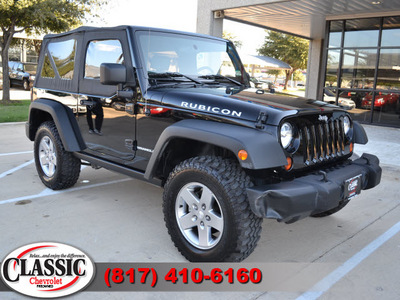 jeep wrangler 2010 black suv rubicon w navigation gasoline 6 cylinders 4 wheel drive manual 76051