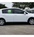 nissan versa 2012 white hatchback 1 8 s gasoline 4 cylinders front wheel drive not specified 77477