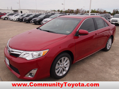 toyota camry 2012 red sedan xle v6 gasoline 6 cylinders front wheel drive automatic 77521