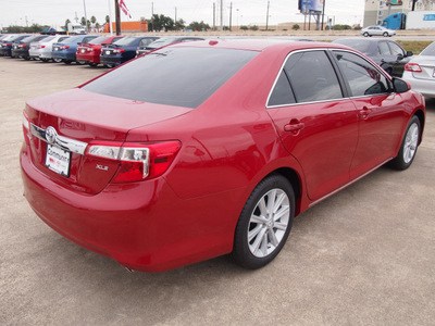 toyota camry 2012 red sedan xle v6 gasoline 6 cylinders front wheel drive automatic 77521