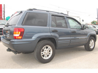 jeep grand cherokee 2004 blue suv special edition gasoline 6 cylinders rear wheel drive automatic 77020
