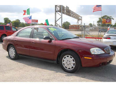 mercury sable 2005 red sedan gs gasoline 6 cylinders front wheel drive automatic 77020