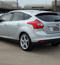 ford focus 2012 silver hatchback titanium flex fuel 4 cylinders front wheel drive automatic with overdrive 77074