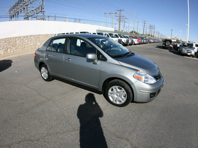 nissan versa 2011 silver sedan 4 cylinders automatic 79925