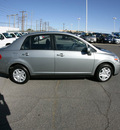 nissan versa 2011 silver sedan 4 cylinders automatic 79925