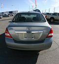 nissan versa 2011 silver sedan 4 cylinders automatic 79925