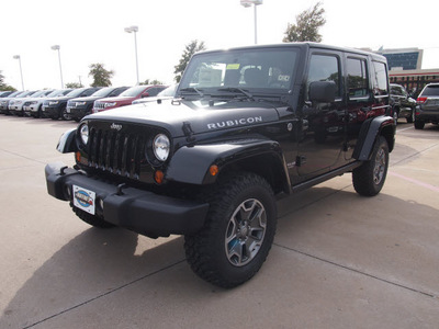 jeep wrangler unlimited 2013 black suv rubicon gasoline 6 cylinders 4 wheel drive automatic 75093